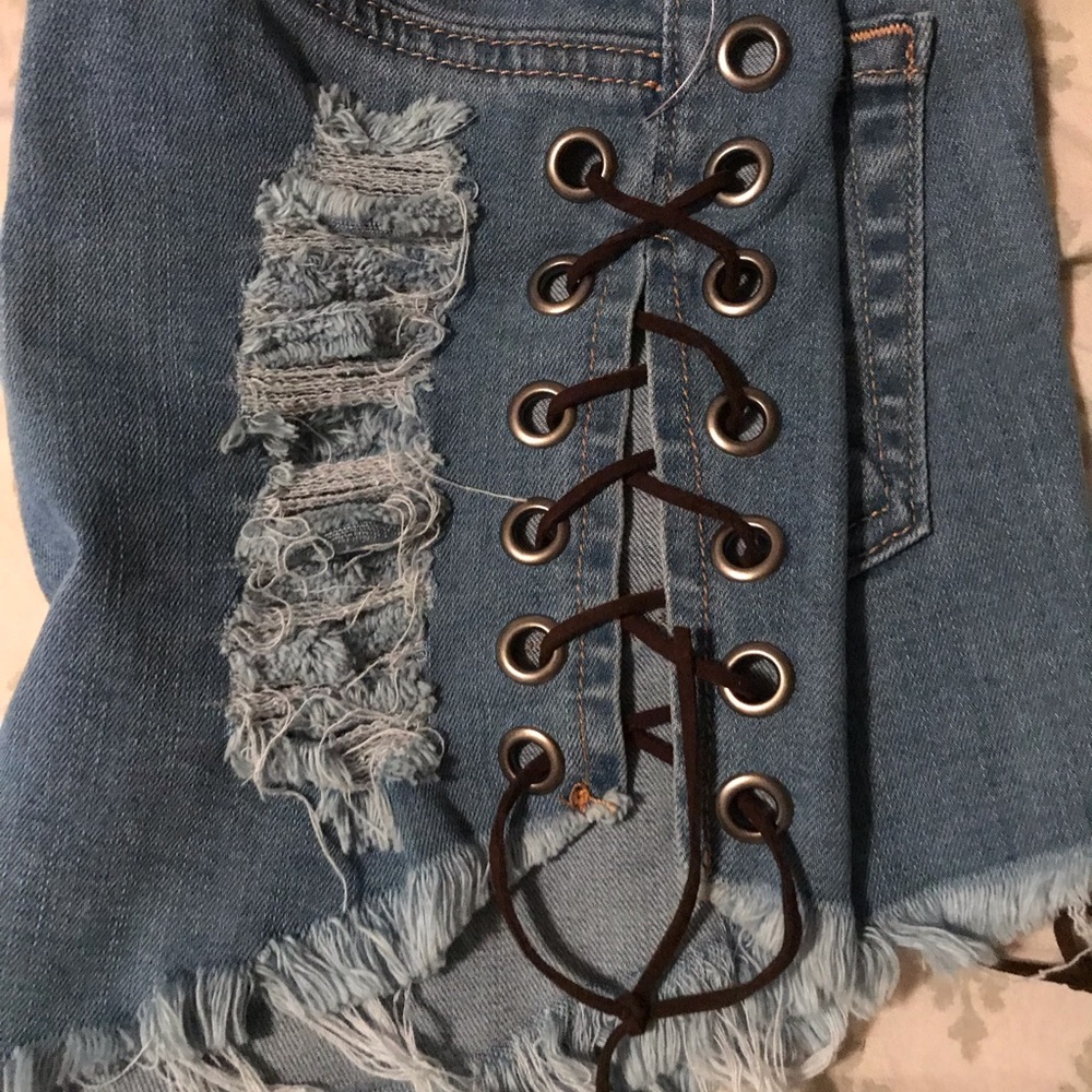 High waisted shorts with lace up side.